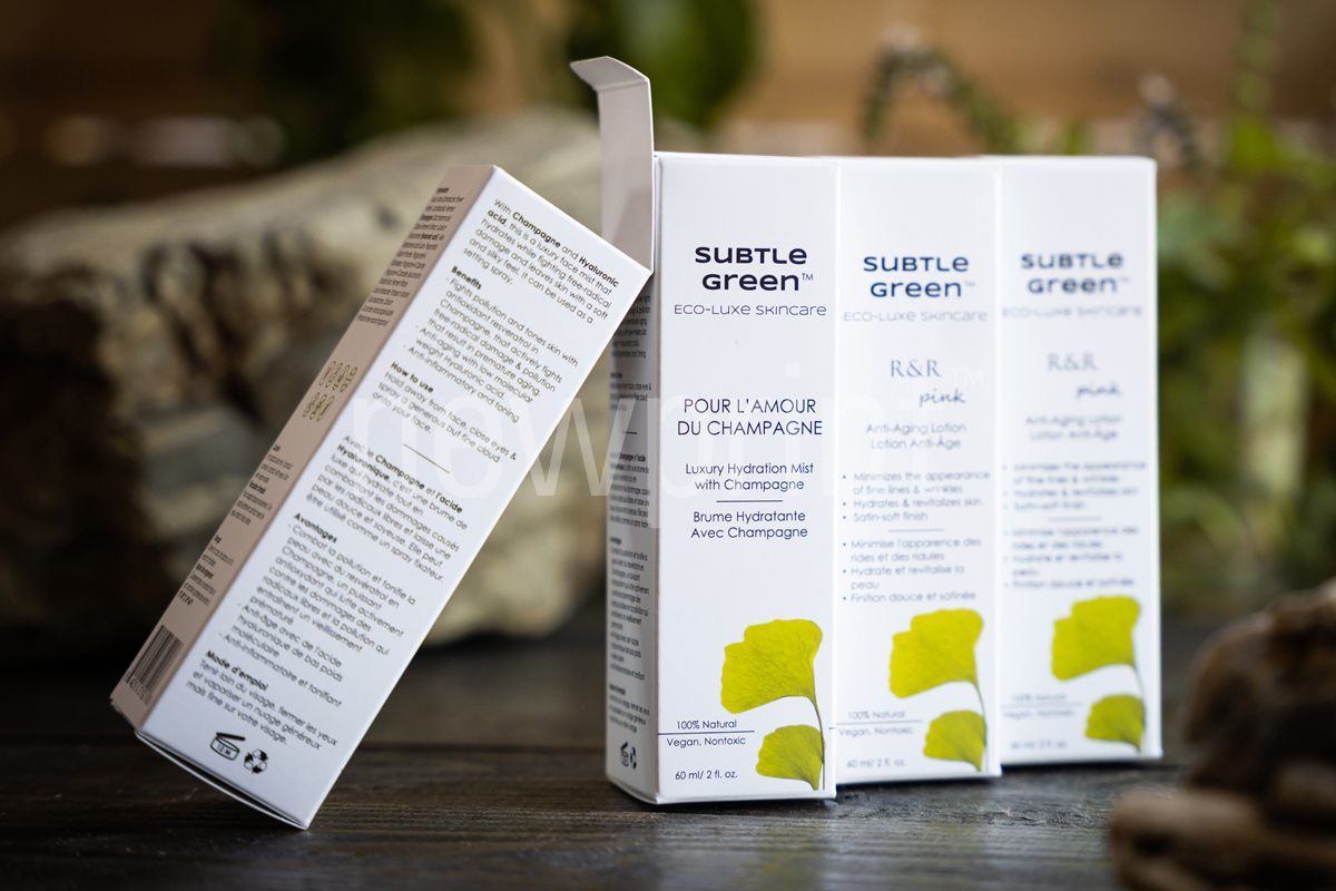 eco friendly cosmetic packaging-Four custom eco-friendly cosmetic packaging boxes for skincare products, one leaning on other three