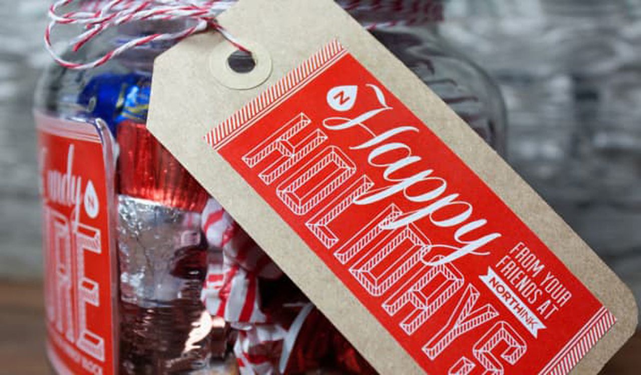 One of the simple hang tag examples  made of kraft paper with label on it. Label has white letters on the red background.